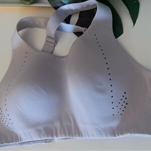 Lululemon AirSupport bra in a light purple or lilac color. The bra features an i
